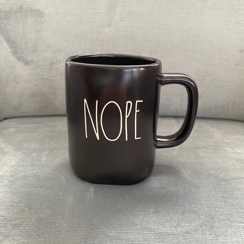 NWOT Rae Dunn “NOPE” mug, black with white lettering